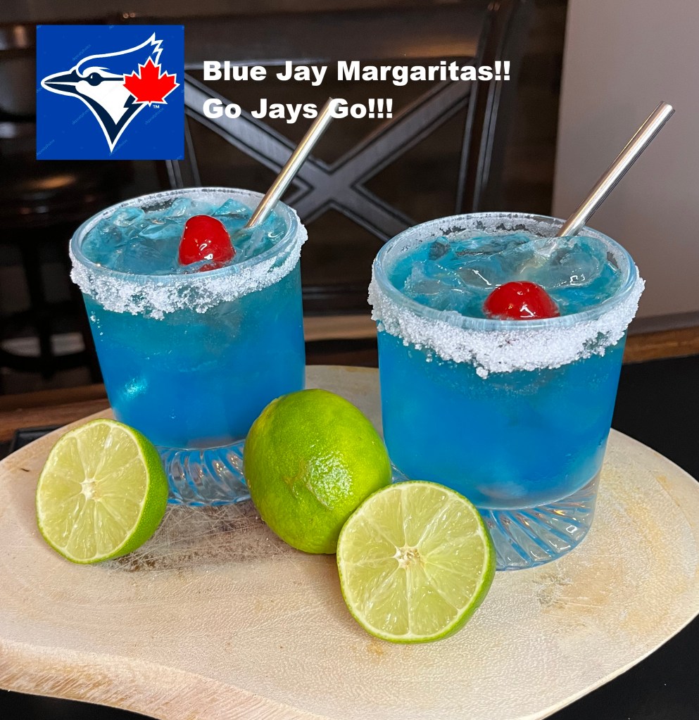 Home crafted authentic blue margarita with fresh limes.  Go Jays Go!  
    