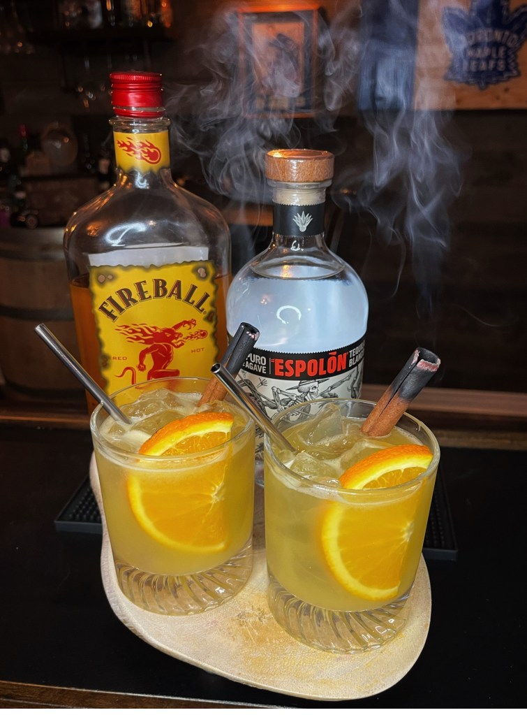 Smokey Cocktail fashioned at home.  Cinnamon, tequila, and orange blend beautifully with smoke. Served in a stylish tumbler with 1/2 orange wheel and smoking cinnamon stick. 